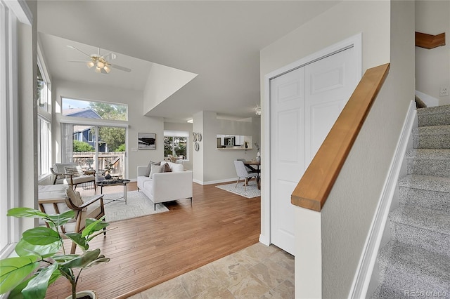 1229 James Cir Unit 1, Lafayette, CO 80026 - living room featuring stairway and a ceiling fan