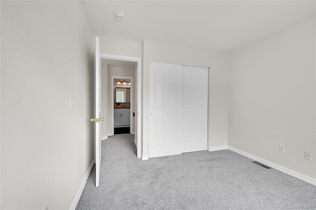 1229 James Cir Unit 1, Lafayette, CO 80026 - unfurnished bedroom with carpet and a closet