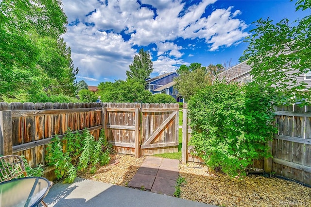 1229 James Cir Unit 1, Lafayette, CO 80026 - fenced backyard featuring a gate