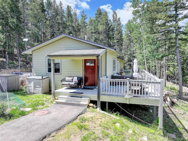 8340 London Ln, Conifer, CO 80433 - view of front of home featuring a deck