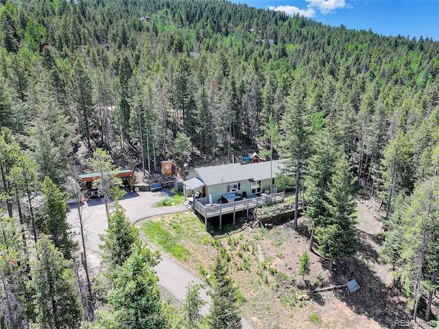 8340 London Ln, Conifer, CO 80433 - view of subject property with a forest