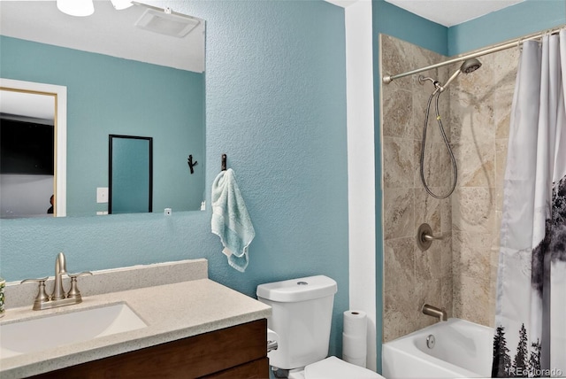 8340 London Ln, Conifer, CO 80433 - bathroom featuring vanity, shower / bath combo with shower curtain, and a textured wall