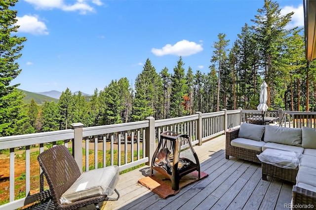 8340 London Ln, Conifer, CO 80433 - deck with an outdoor hangout area