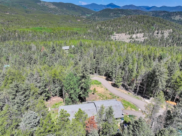 8340 London Ln, Conifer, CO 80433 - aerial view of a mountain backdrop and a heavily wooded area