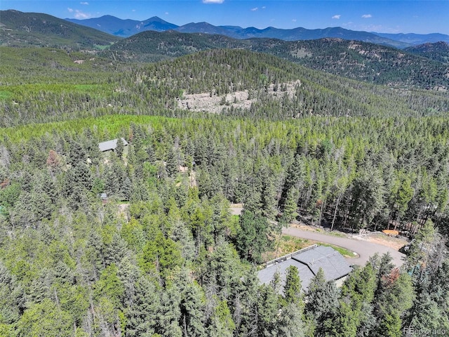8340 London Ln, Conifer, CO 80433 - drone / aerial view of a forest and a mountain backdrop