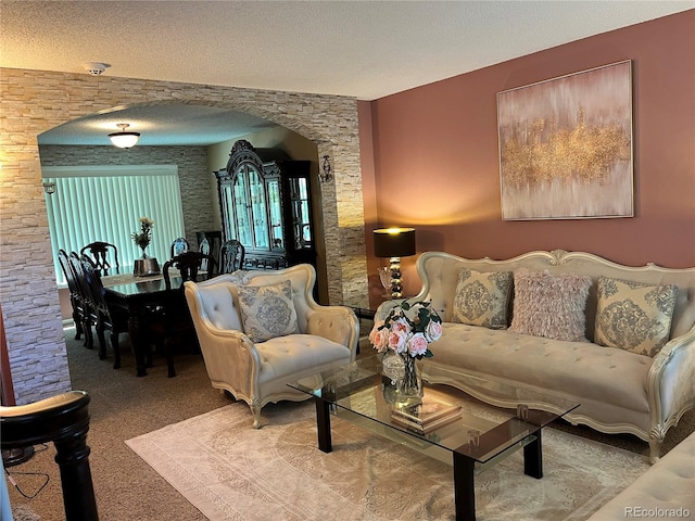 living room featuring a textured ceiling