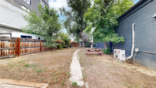 view of yard featuring ac unit