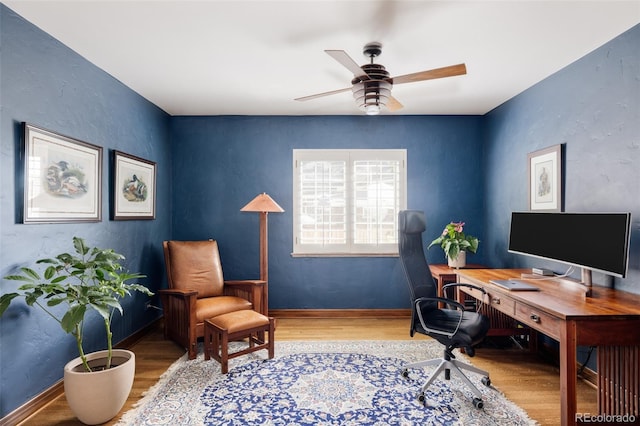 office area featuring hardwood / wood-style flooring and ceiling fan