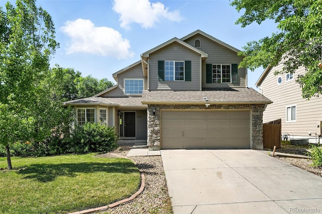 22501 E Belleview Pl, Aurora, CO 80015 - traditional-style home featuring stone siding, concrete driveway, a garage, and a shingled roof