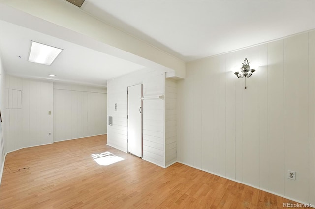 22501 E Belleview Pl, Aurora, CO 80015 - unfurnished room featuring light wood-style flooring