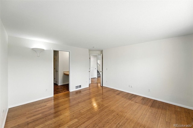 22501 E Belleview Pl, Aurora, CO 80015 - empty room with wood finished floors