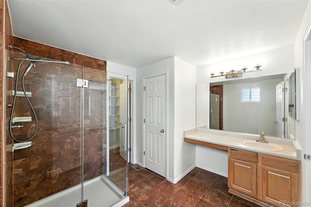 22501 E Belleview Pl, Aurora, CO 80015 - bathroom featuring a shower stall and vanity