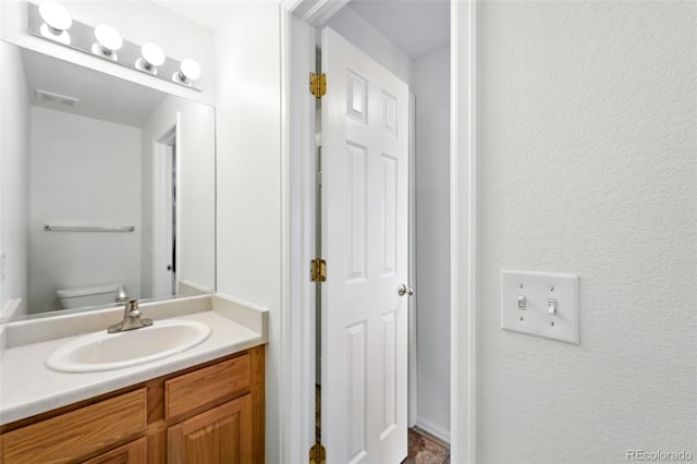 22501 E Belleview Pl, Aurora, CO 80015 - bathroom featuring vanity and toilet