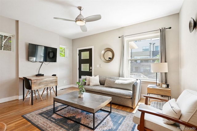 2645 W 24th Ave, Denver, CO 80211 - living room with light wood-style floors and a ceiling fan