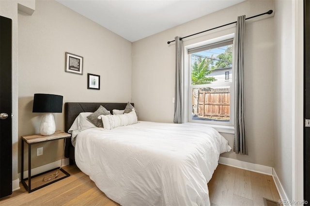 2645 W 24th Ave, Denver, CO 80211 - bedroom with wood finished floors and baseboards