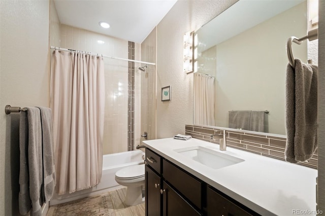 2645 W 24th Ave, Denver, CO 80211 - bathroom with a textured wall, vanity, shower / bath combo with shower curtain, and tasteful backsplash