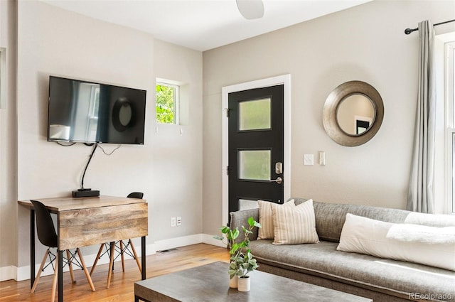 2645 W 24th Ave, Denver, CO 80211 - living area featuring light wood-style flooring and an office area