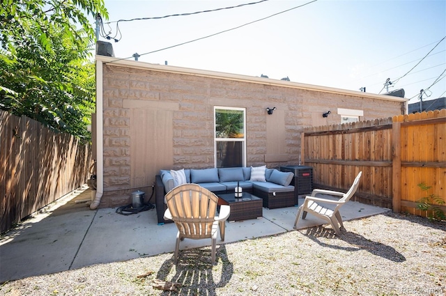 2645 W 24th Ave, Denver, CO 80211 - fenced backyard with an outdoor living space and a patio area