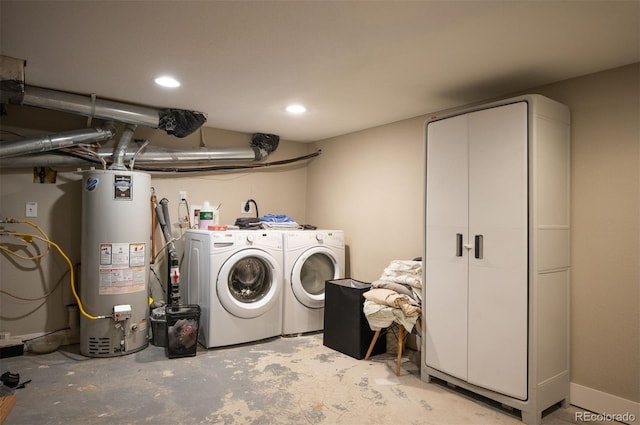 2645 W 24th Ave, Denver, CO 80211 - washroom with gas water heater, washer and dryer, and recessed lighting