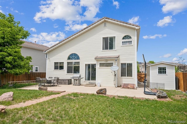 20338 E 48th Dr, Denver, CO 80249 - rear view of house with a patio and entry steps