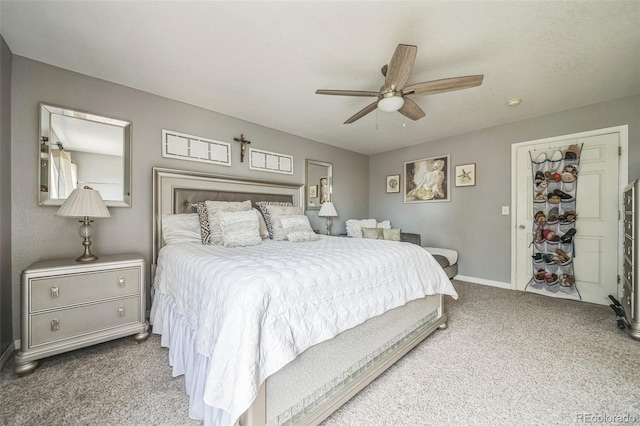 20338 E 48th Dr, Denver, CO 80249 - carpeted bedroom featuring baseboards and a ceiling fan