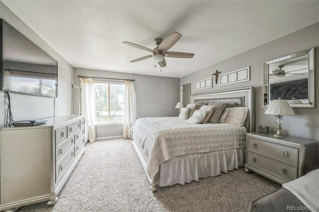 20338 E 48th Dr, Denver, CO 80249 - bedroom featuring carpet floors, a textured ceiling, and a ceiling fan