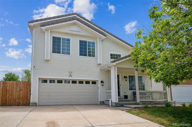 20338 E 48th Dr, Denver, CO 80249 - traditional-style home with a porch, concrete driveway, and a garage