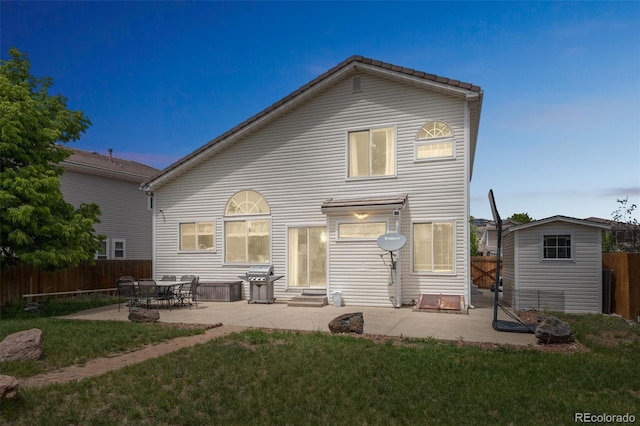 20338 E 48th Dr, Denver, CO 80249 - back of house with a patio and entry steps
