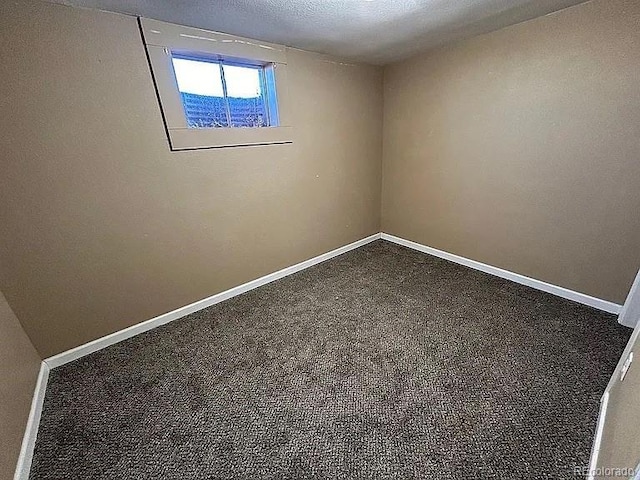 921 Dakin St, Denver, CO 80221 - carpeted spare room featuring baseboards