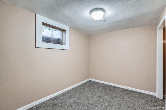 921 Dakin St, Denver, CO 80221 - carpeted empty room with baseboards and a textured ceiling