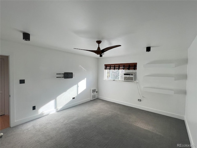 spare room featuring carpet flooring, heating unit, ceiling fan, and cooling unit