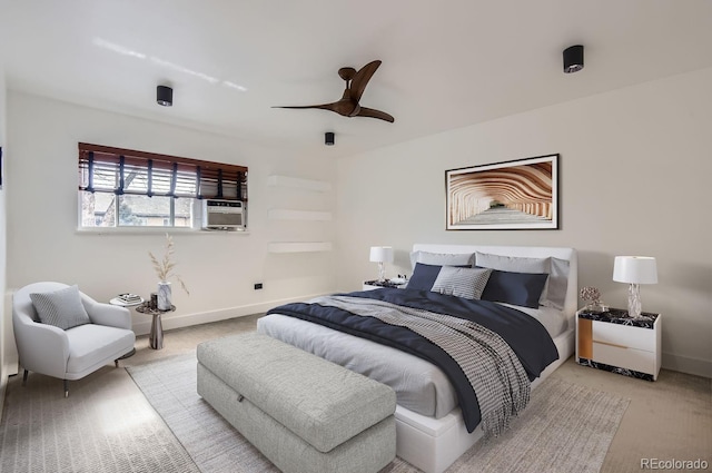 bedroom with cooling unit, light colored carpet, and ceiling fan