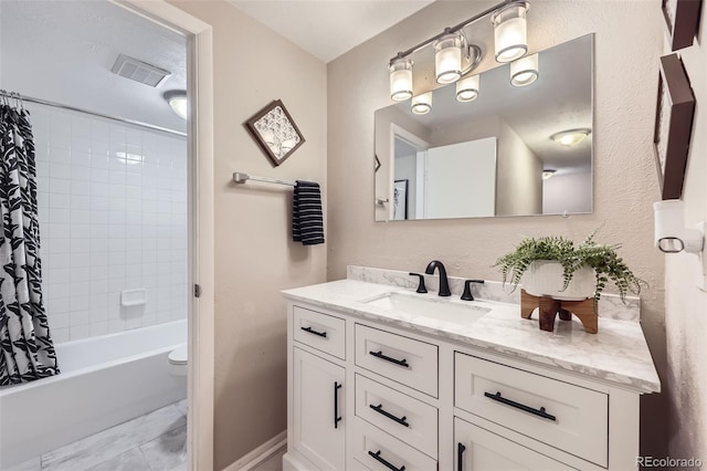 full bathroom featuring vanity, toilet, and shower / tub combo