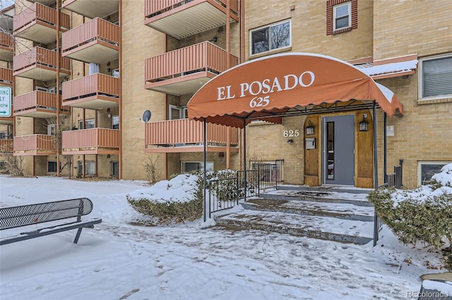 view of snow covered property