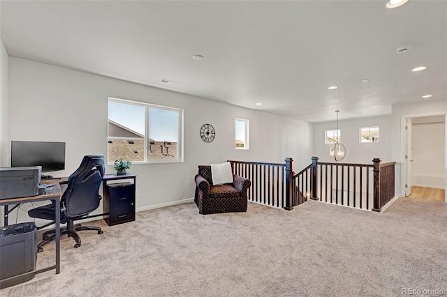 carpeted home office featuring healthy amount of natural light, recessed lighting, and baseboards
