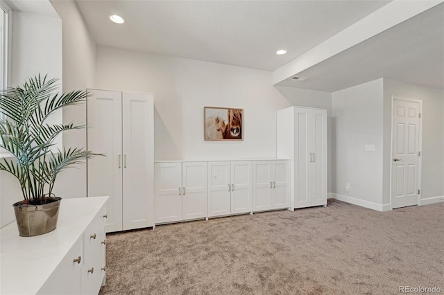 bonus room featuring carpet floors, baseboards, and recessed lighting