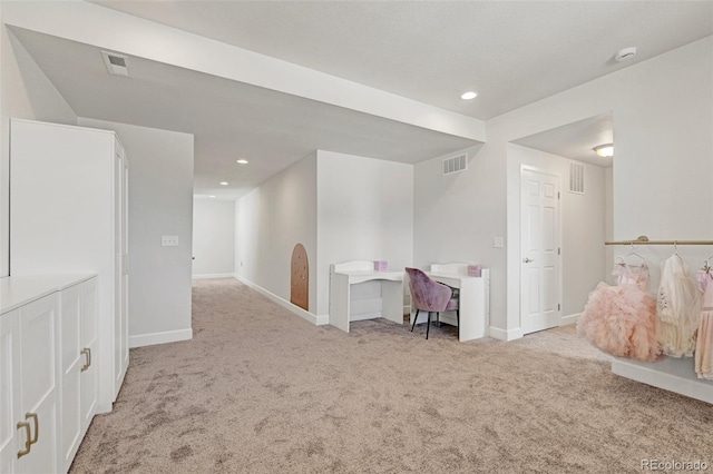 unfurnished room with light colored carpet, baseboards, a smoke detector, and recessed lighting