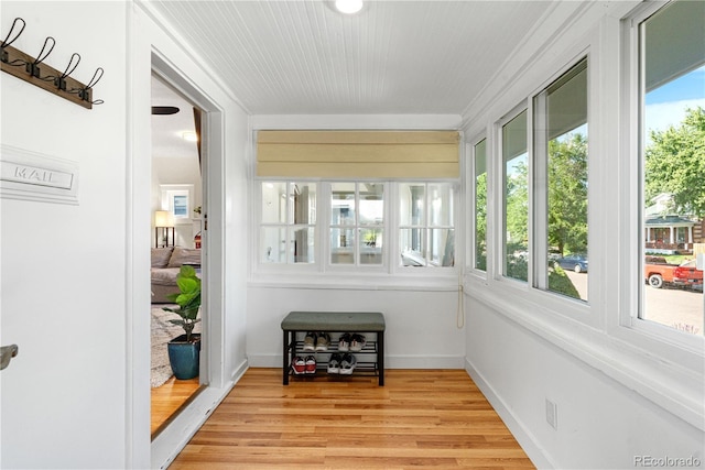 4501 Zenobia St, Denver, CO 80212 - sunroom / solarium featuring wood finished floors and baseboards