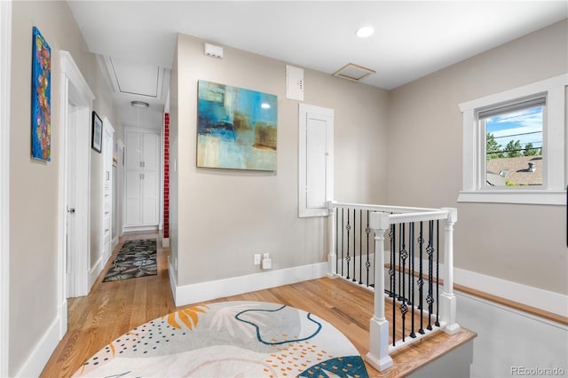 4501 Zenobia St, Denver, CO 80212 - hall featuring attic access, an upstairs landing, light wood-style flooring, and recessed lighting