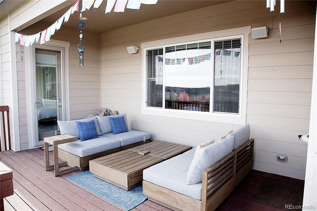 3910 Mighty Oaks St, Castle Rock, CO 80104 - wooden deck with an outdoor living space