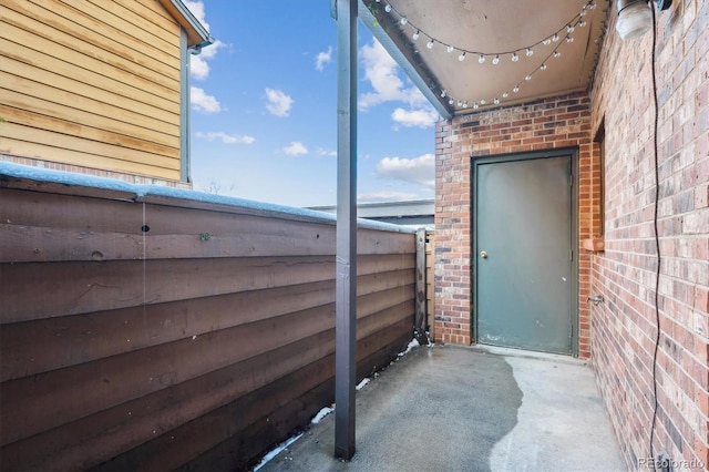 2277 S Buckley Rd Unit 102, Aurora, CO 80013 - entrance to property with brick siding and a patio