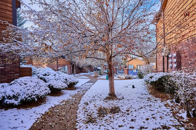 2277 S Buckley Rd Unit 102, Aurora, CO 80013 - view of snowy yard
