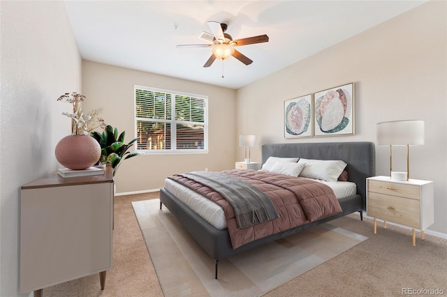 9637 E 5th Ave Unit 101, Denver, CO 80230 - bedroom with light colored carpet and ceiling fan