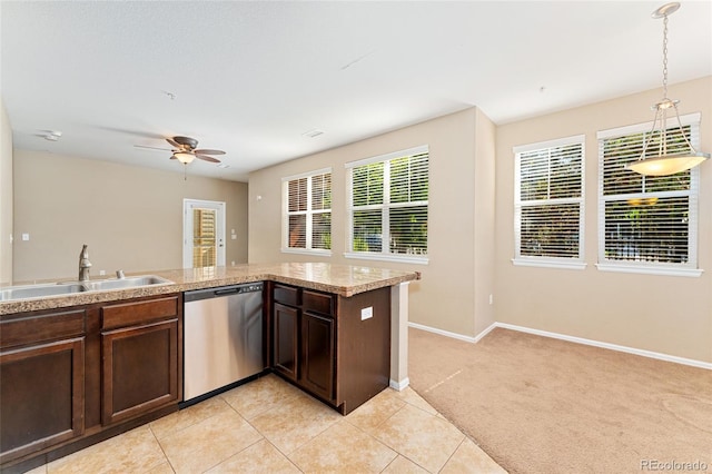 9637 E 5th Ave Unit 101, Denver, CO 80230 - kitchen featuring dishwasher, dark brown cabinetry, decorative light fixtures, a ceiling fan, and light colored carpet