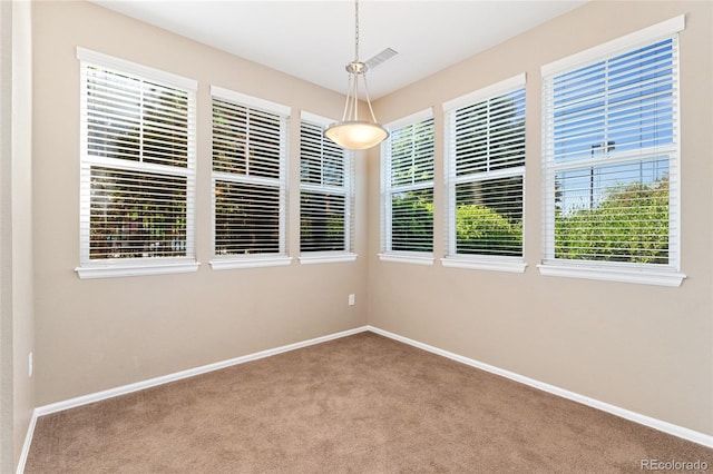 9637 E 5th Ave Unit 101, Denver, CO 80230 - spare room featuring carpet floors and baseboards