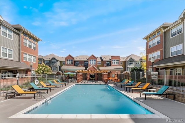 9637 E 5th Ave Unit 101, Denver, CO 80230 - community pool featuring a residential view and a patio area
