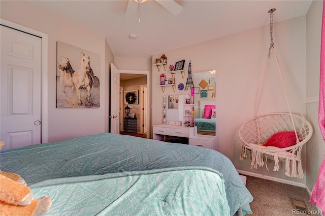 bedroom featuring baseboards, a ceiling fan, and carpet