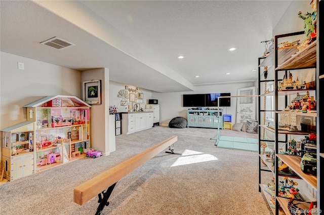 playroom featuring recessed lighting, carpet flooring, and visible vents