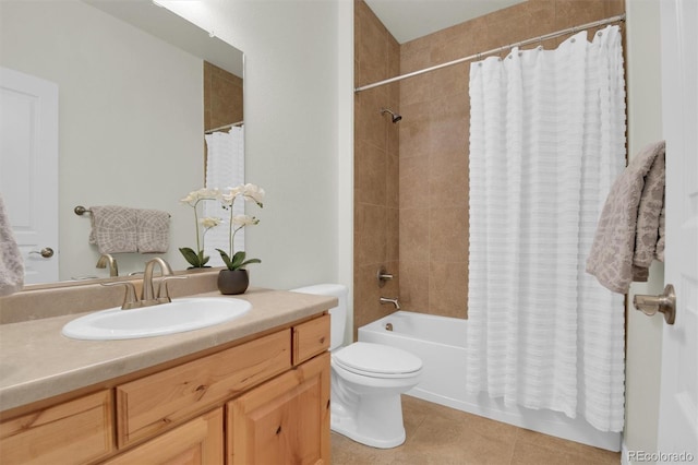 bathroom featuring shower / tub combo with curtain, tile patterned flooring, toilet, and vanity