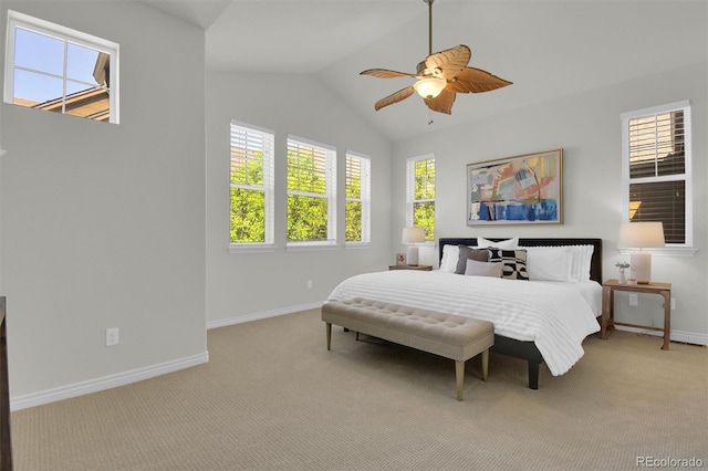 bedroom with carpet floors, baseboards, vaulted ceiling, and ceiling fan